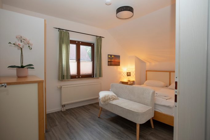 Wohnung Julia - Schlafzimmer Ferienhaus Lotz - Wohnung Julia - Schlafzimmer tagsüber