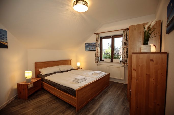 Wohnung Milana - Schlafzimmer abends Ferienhaus Lotz - Wohnung Milana - Schlafzimmer abends